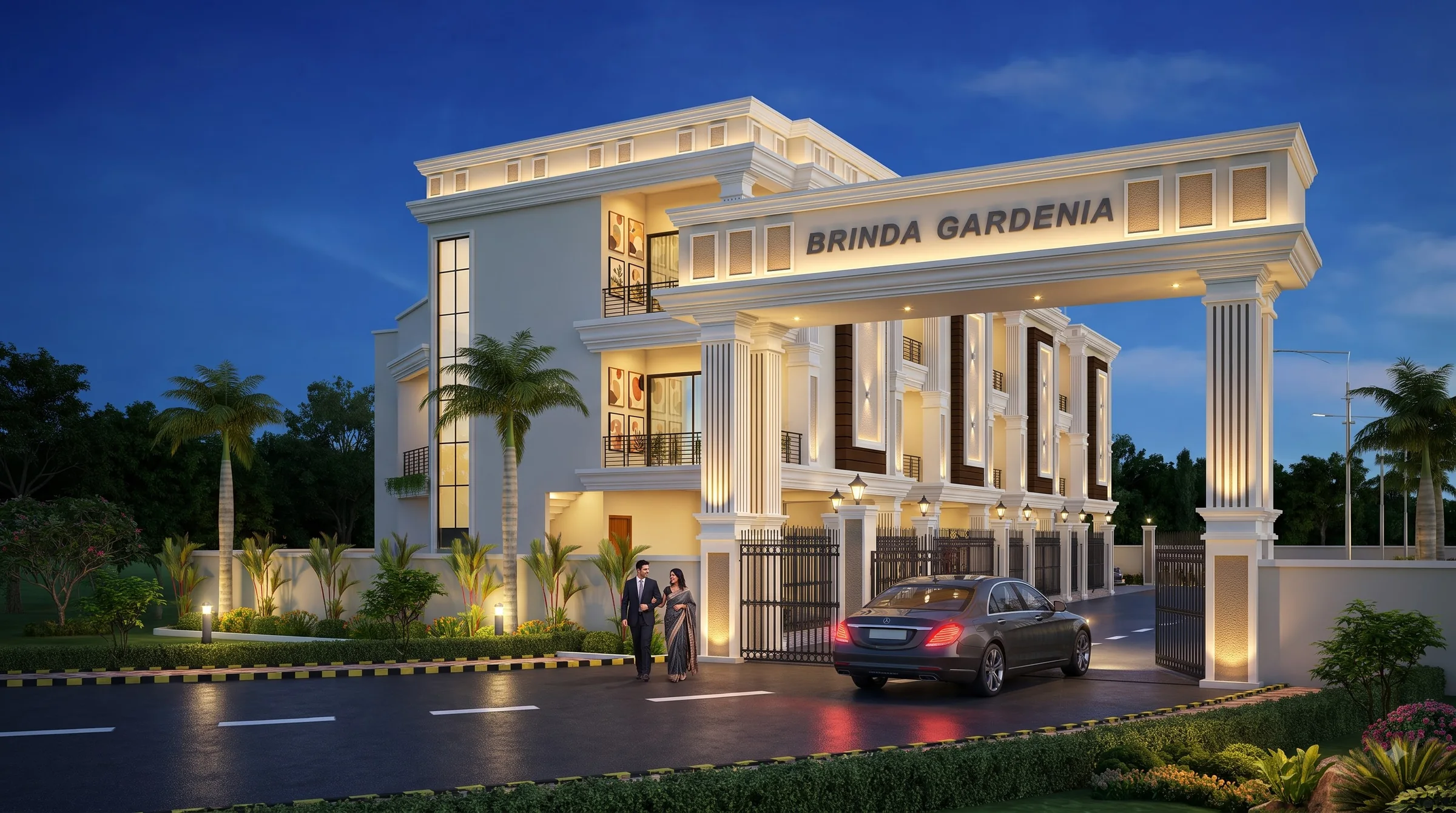 A luxury sedan arriving through the illuminated Brinda Gardenia entrance at dusk